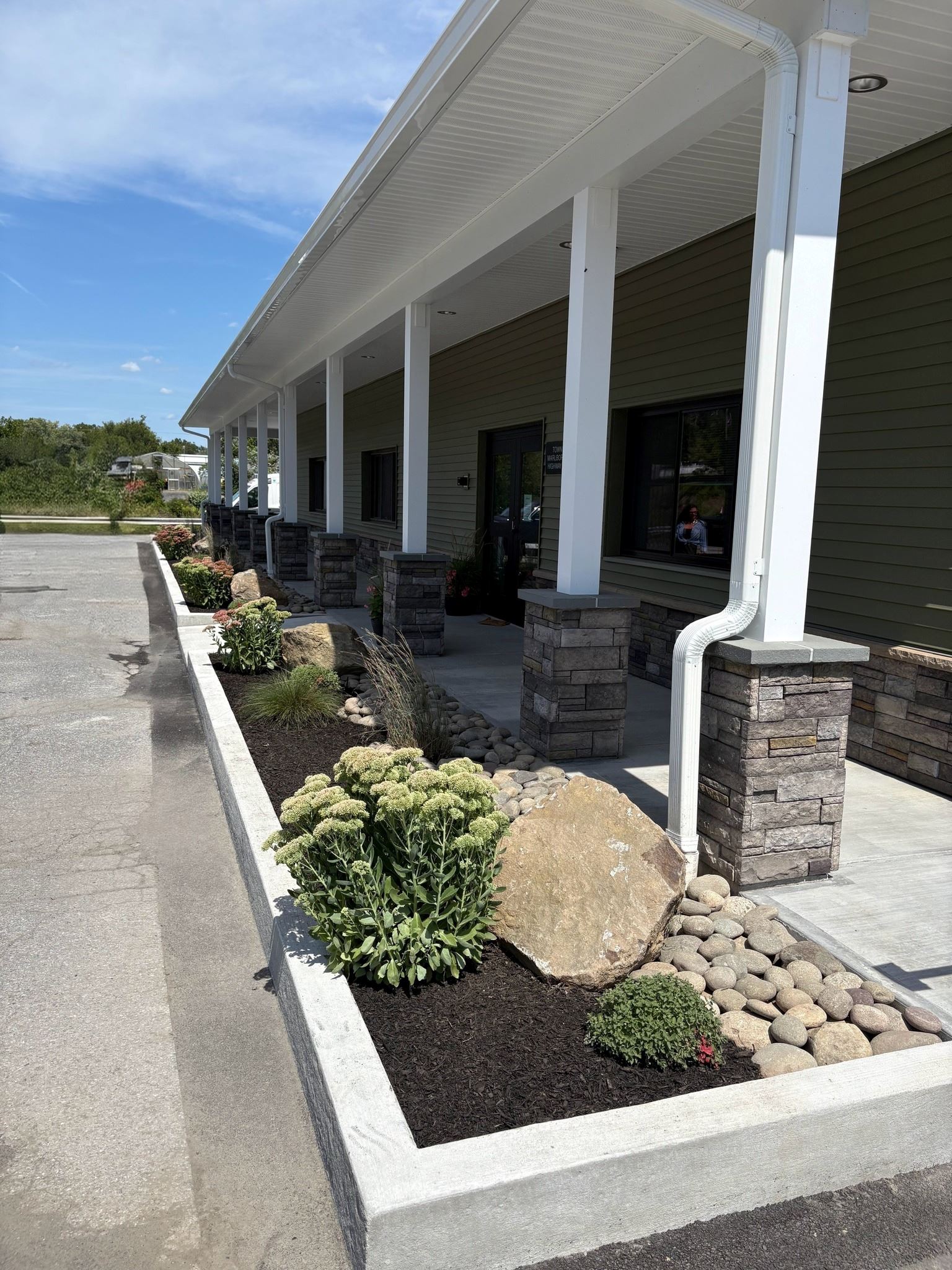 FRONT OF NEW HIGHWAY DEPARTMENT BUILDING WITH LANDSCAPING